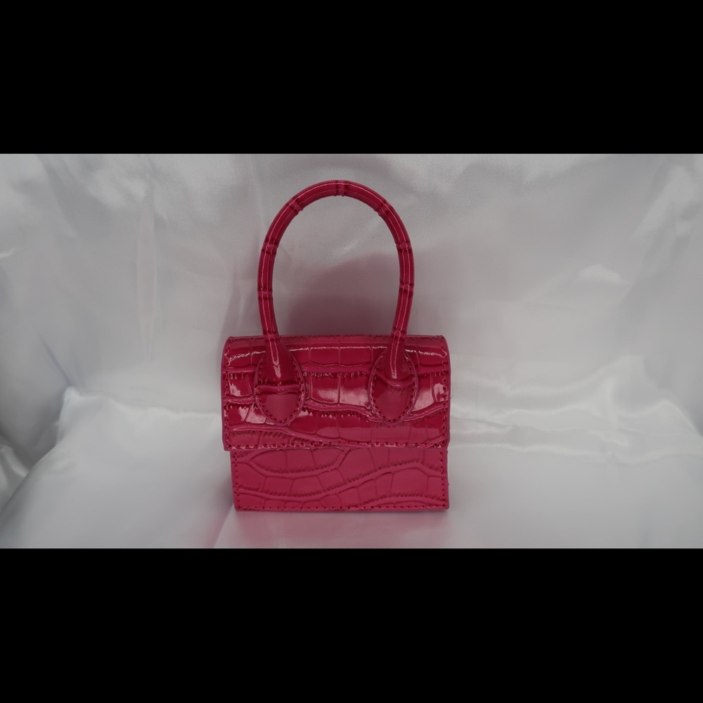 **NEVER WORN** pink mini crocodile luxury material handbag purse